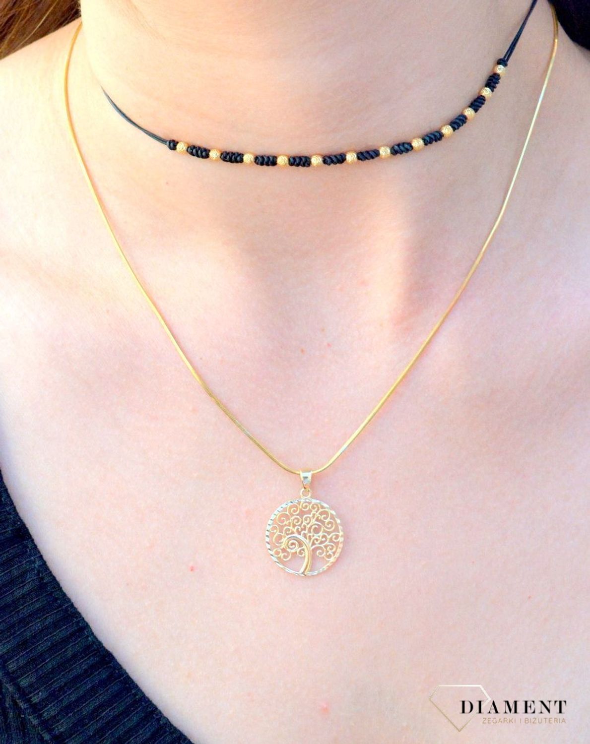 Złota zawieszka 'Drzewko szczęścia z białym złotem' ZA 4653 333. Nowoczesna zawieszka złota zawieszka drzewko szczęścia z białym złotem, w którym znajduje się kształt drzewka, które zostało ozdobione.jpg